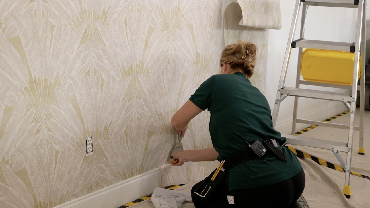Close view of a wallpaper installation detail and finished wall surface